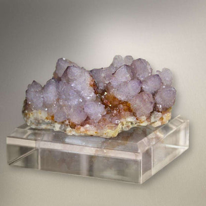 Amethyst Spirit Quartz cluster from Boekenhouthoek, South Africa with soft lavender points and sparkling cactus quartz texture.