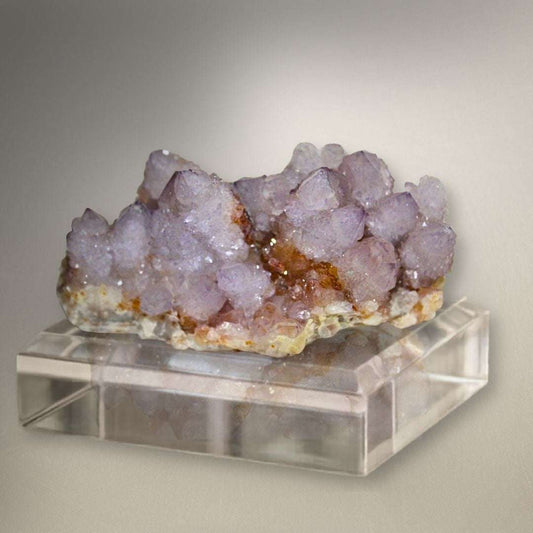 Amethyst Spirit Quartz cluster from Boekenhouthoek, South Africa with soft lavender points and sparkling cactus quartz texture.