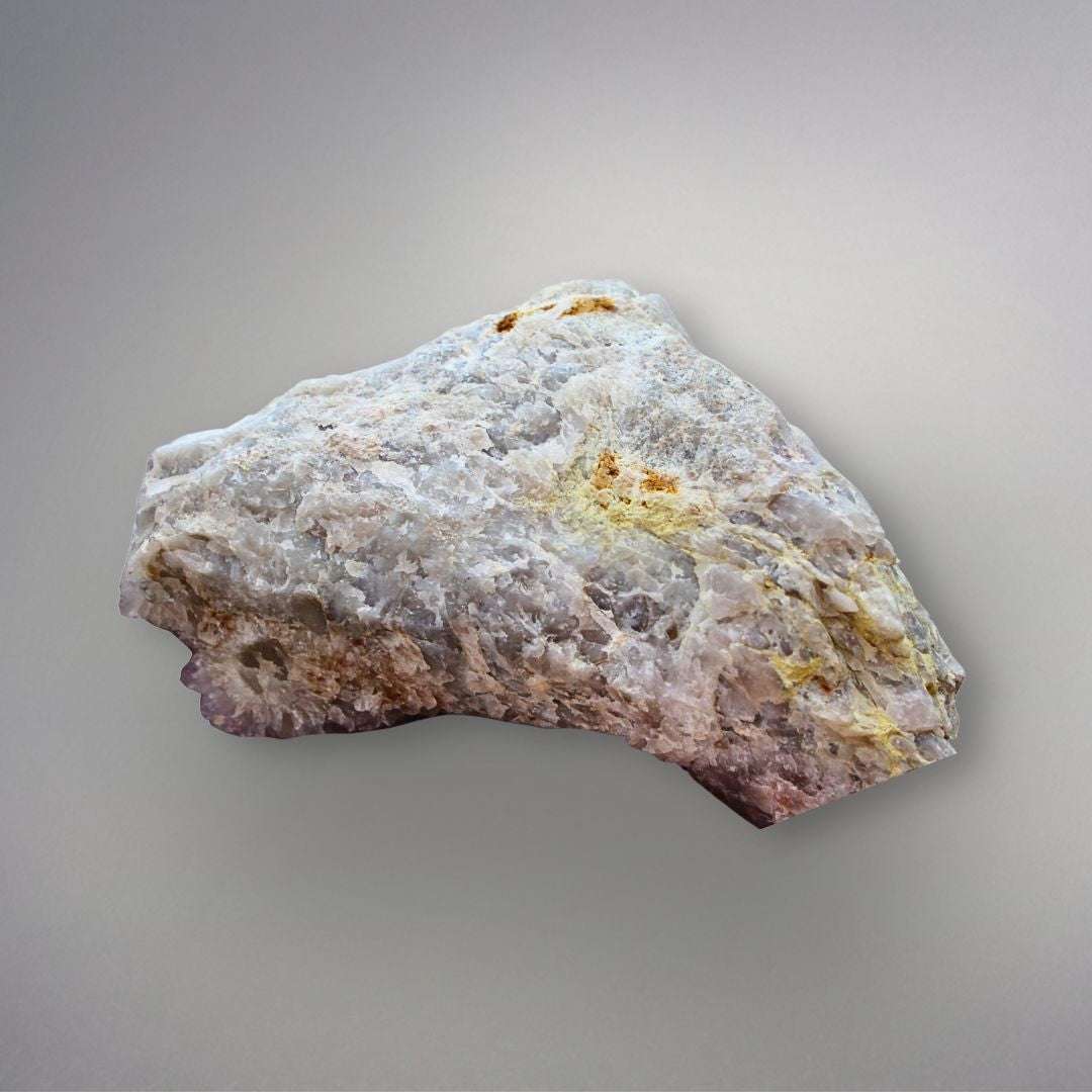 Bottom view of large Amethyst Spirit Quartz cluster showing natural matrix, quartz structure, and iron-rich mineral accents.