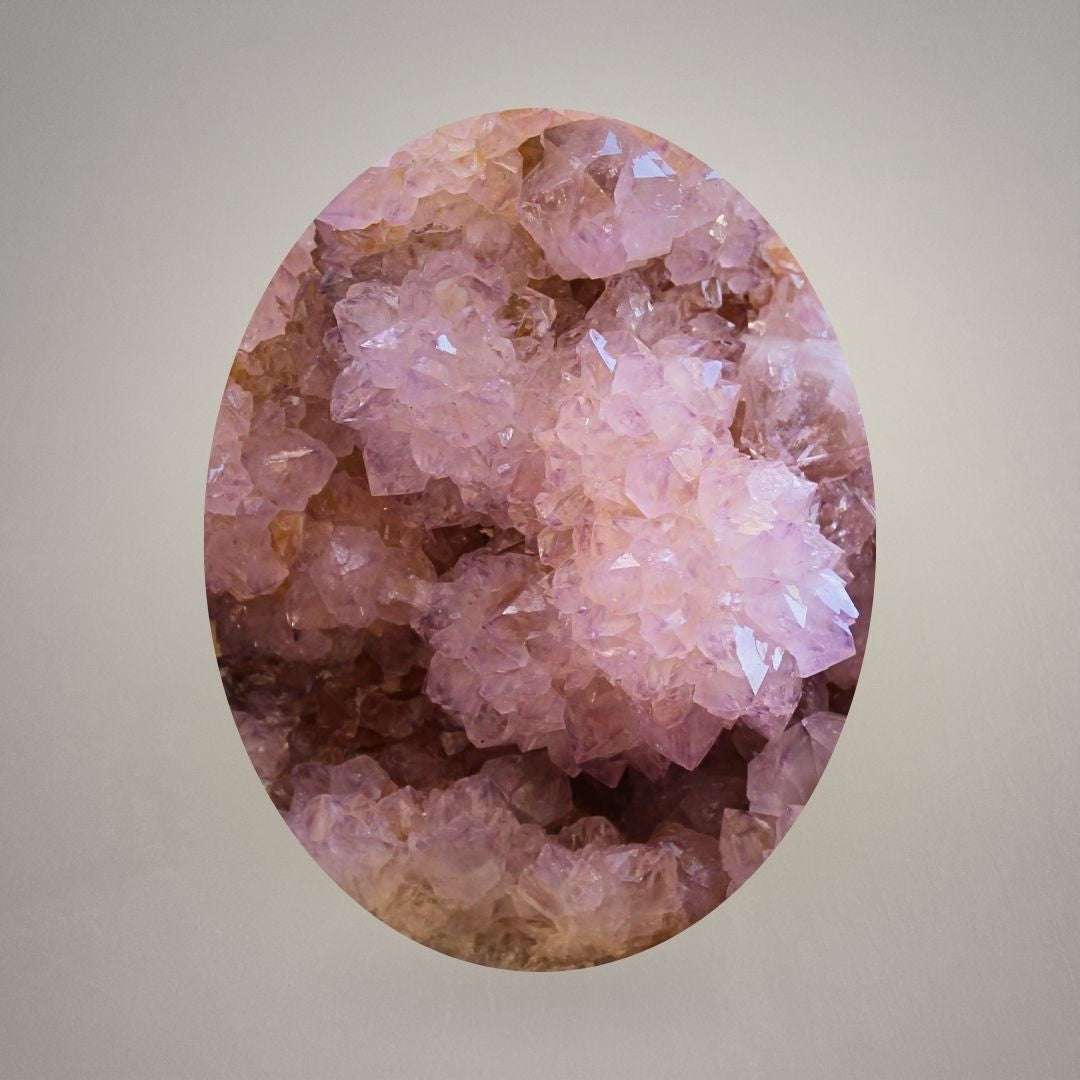 Macro view of large Amethyst Spirit Quartz showing lavender points covered in fine druzy cactus quartz crystals.
