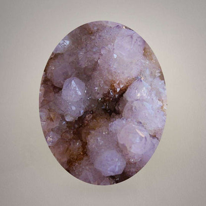 Close macro view of Amethyst Spirit Quartz with pale purple crystal points and sparkling secondary druzy growth.