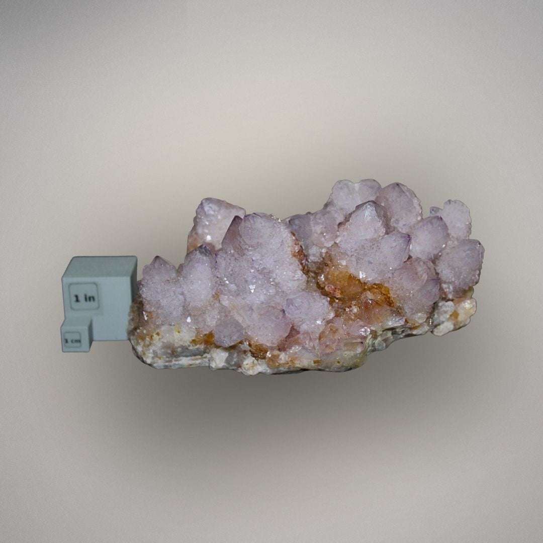 Amethyst Spirit Quartz cluster from South Africa shown with one inch scale cube for size reference.