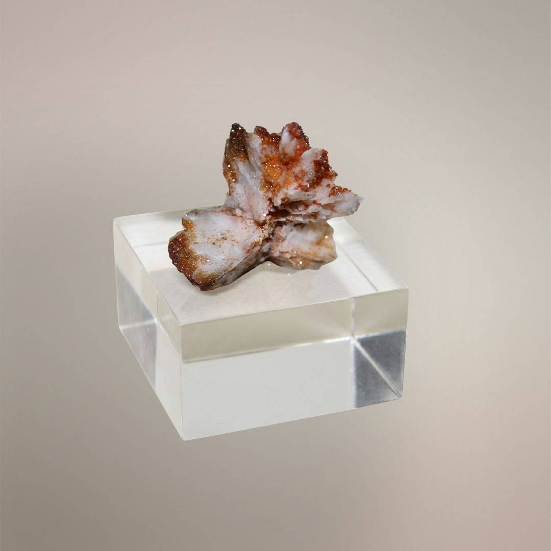 Reverse view of Moroccan Vanadinite over Barite showing white Barite matrix and red-orange crystal growth