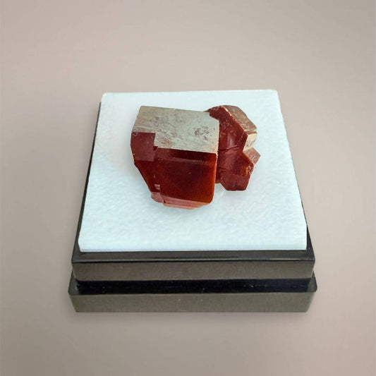 Vanadinite thumbnail specimen with red-orange hexagonal crystal structure and secondary intergrowth in display box