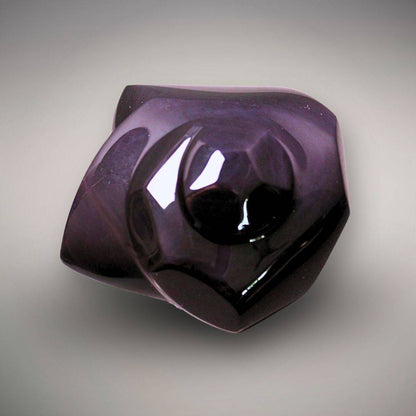 Front view of the exact Velvet Rainbow Obsidian freeform showing its sculptural polished form and visible purple flash.
