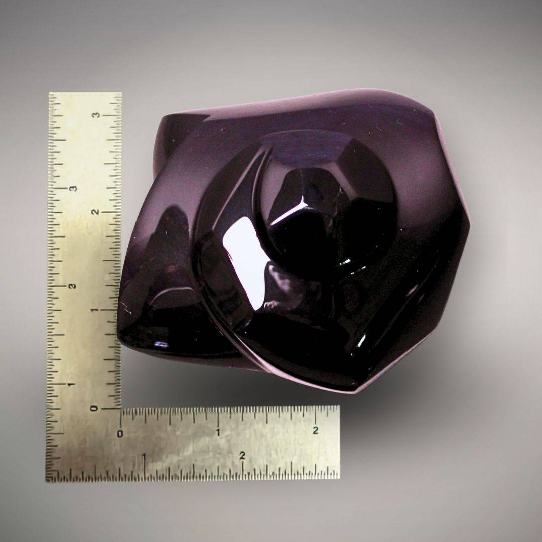 Velvet Rainbow Obsidian freeform beside rulers showing its approximate 3 × 3 in. scale and polished purple-black surface.