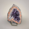 Waldhambach Germany agate specimen with deep purple amethyst core, rose-orange banding, and polished face on display stand.